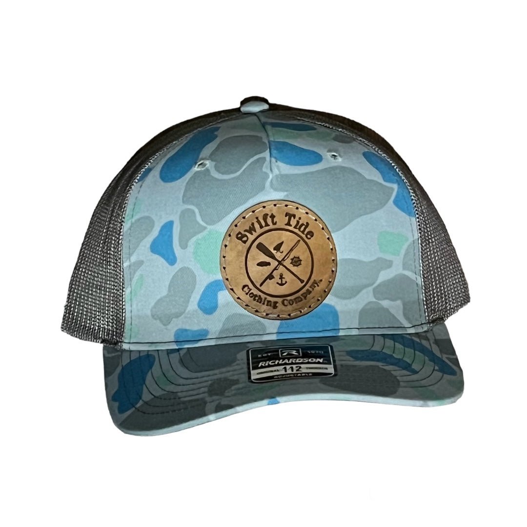 We The Essentials Camo Trucker Hat with Leather Patch